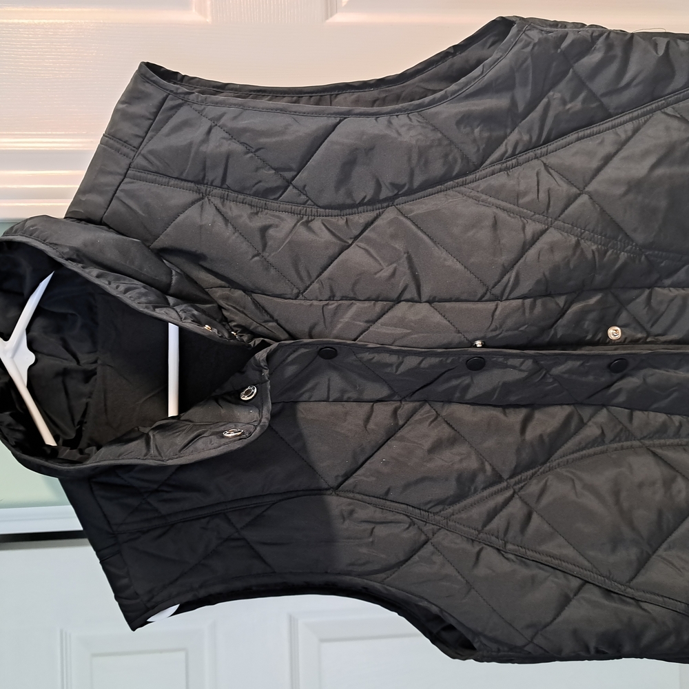 Black Quilted Vest.  Tried on.  Never worn...